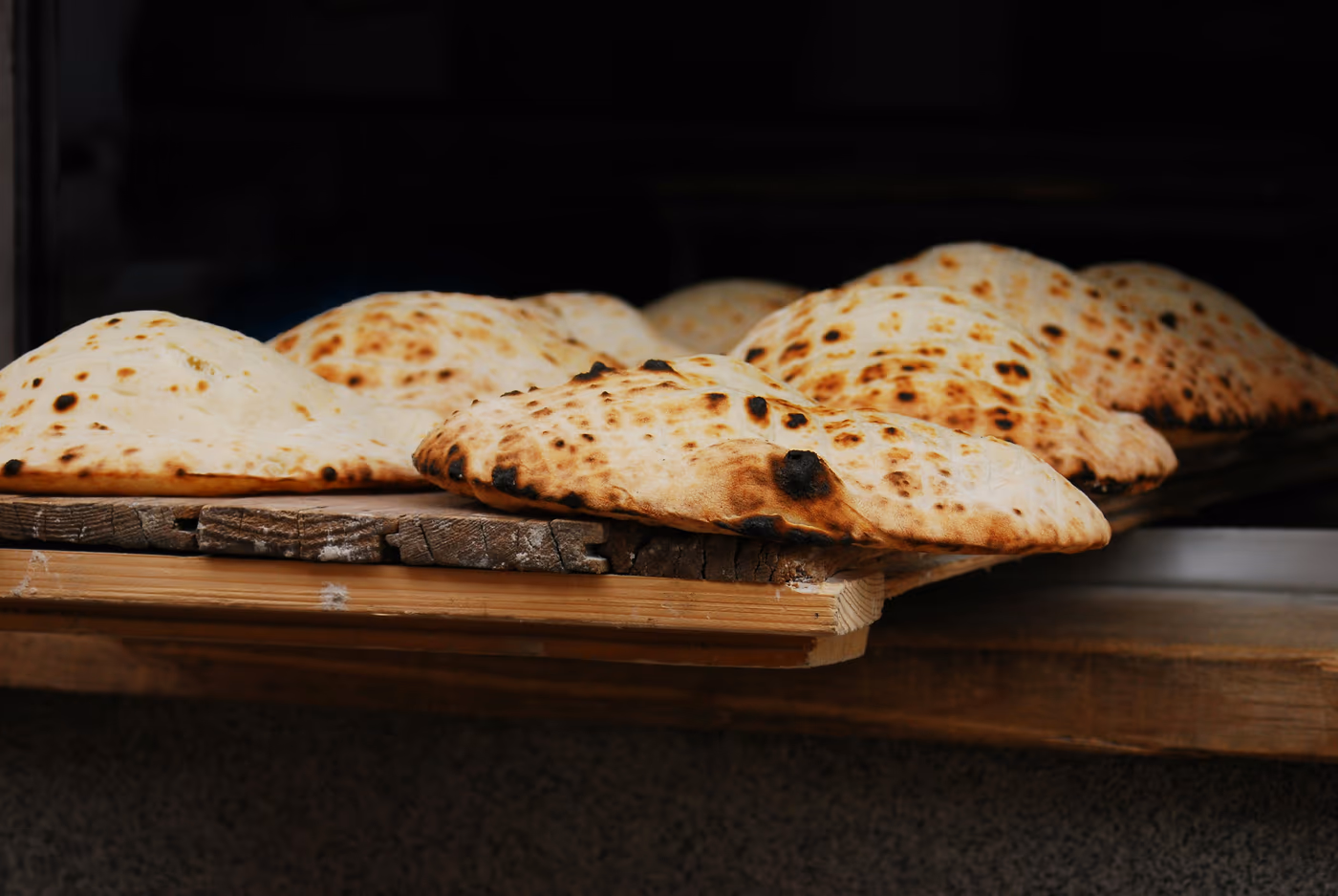 Fresh naan and Lahori dishes prepared for venue catering