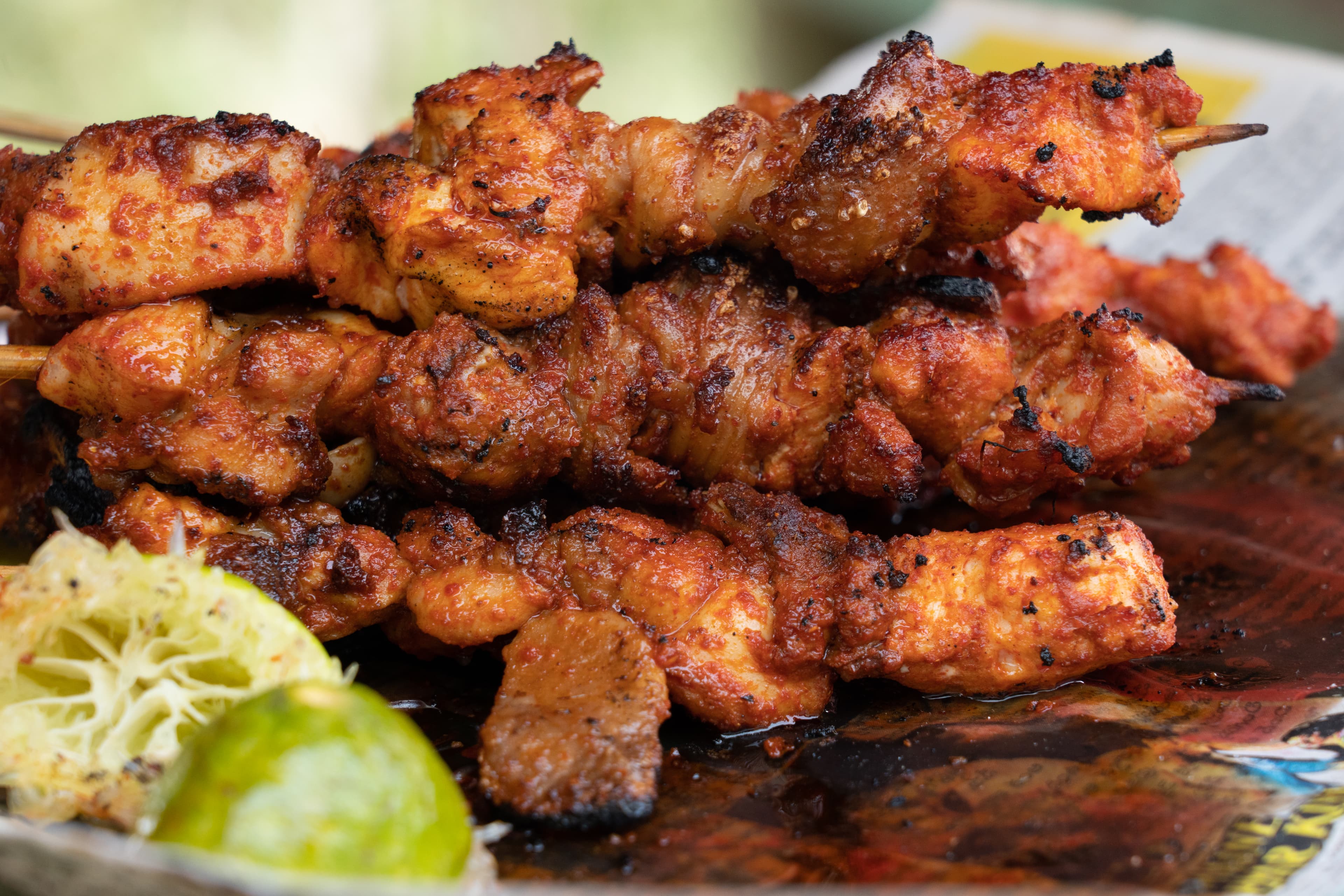 Chicken tikka with charred edges and warm spices